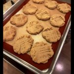 Delicious homemade peanut butter cookies with golden-brown edges, perfect for snacking or sharing.